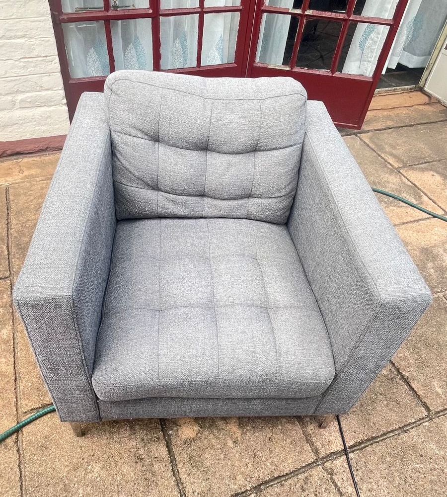 Grey armchair after cleaning and fabric protection